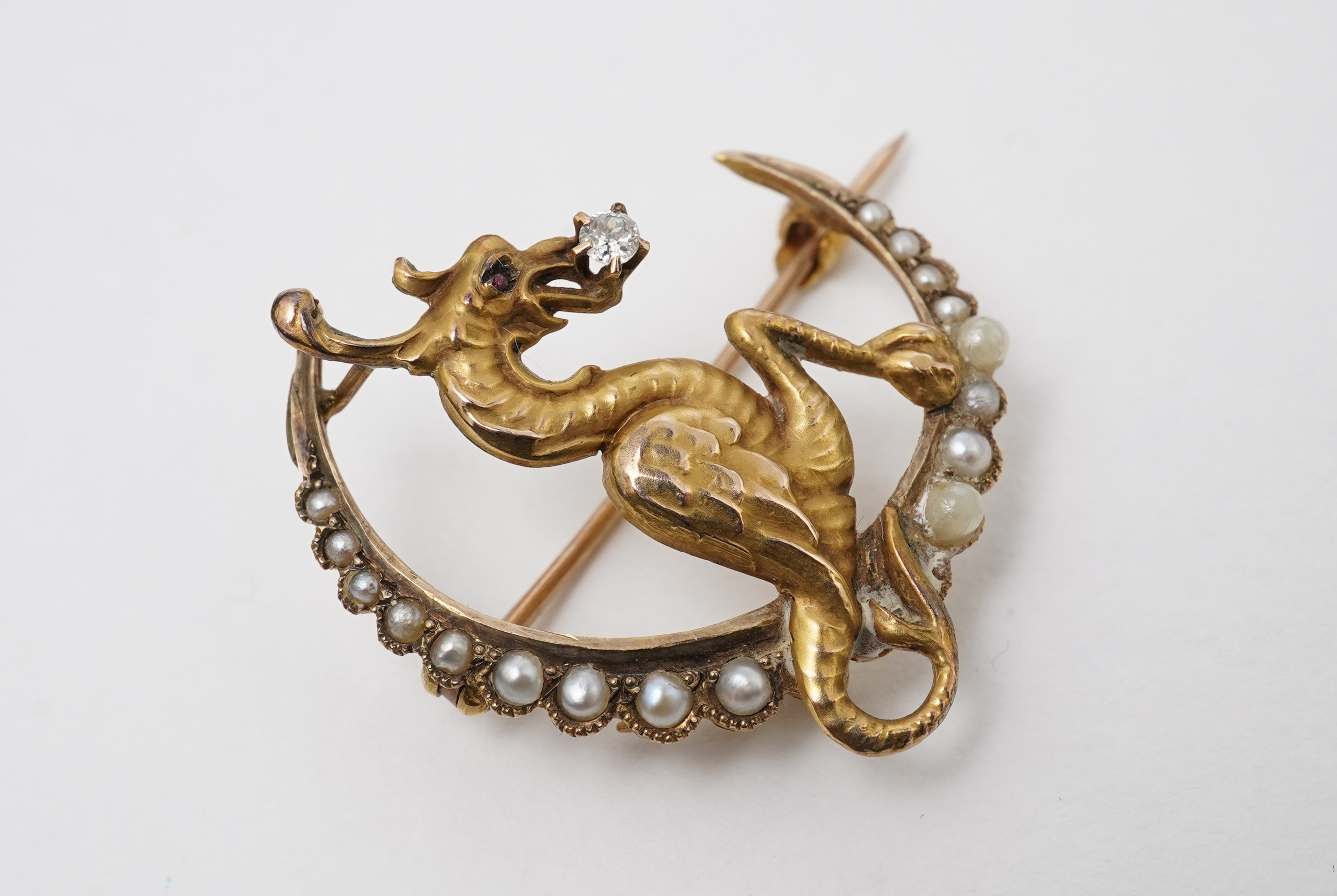An Art Nouveau pearl and diamond brooch, early 20th century